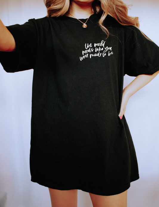 The World Needs Who You Were Made To Be Pocket Style TEE: Small / Black